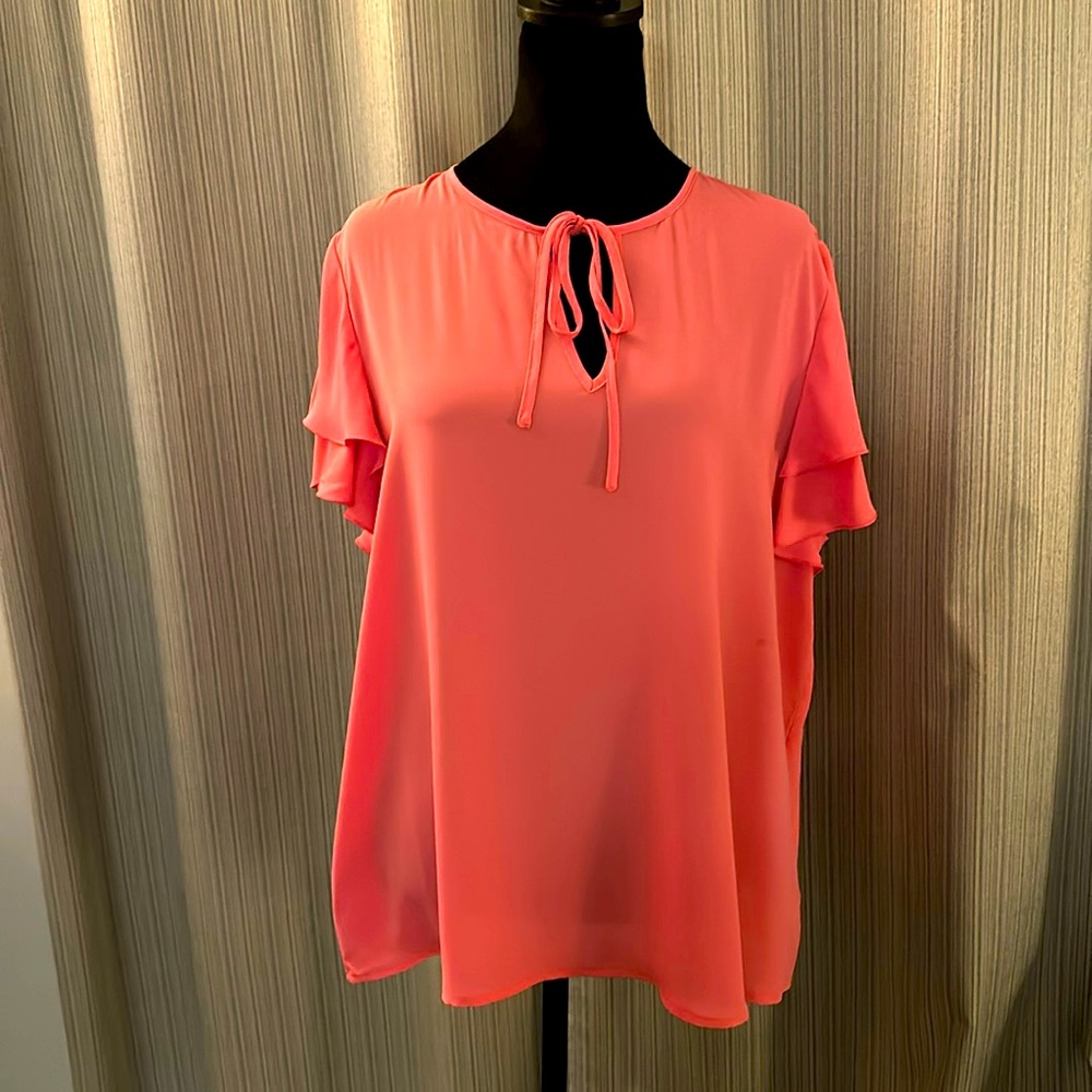 Pink short sleeved blouse. Size XL, New York, and Company.